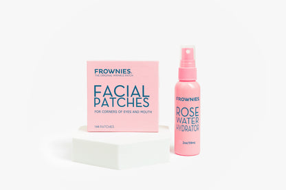 Frownies Rose Water Hydrator och Facial Patches-förpackning sida vid sida mot vit bakgrund.