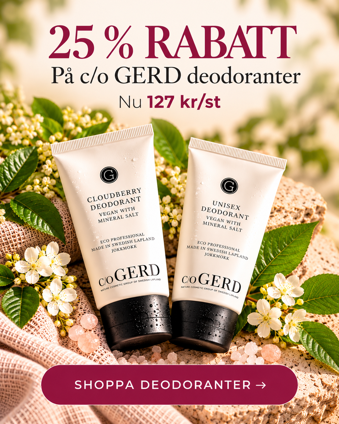 2 deodoranter från c/o Gerd liggandes på en vacker bädd av linne och blommor.